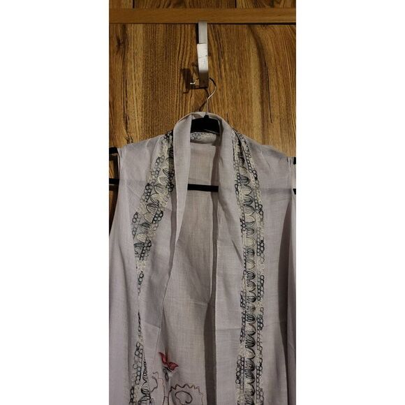 2 white sheer open cardigans with colorful designs at hem - Picture 4 of 13